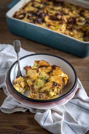 Prepred and served traditional Greek moussaka in the plate,selective focusの写真素材