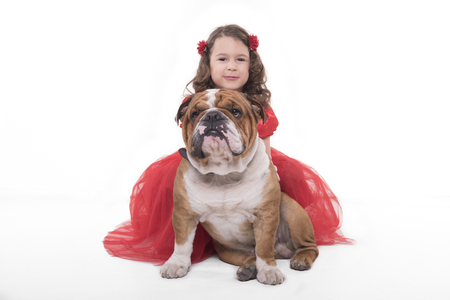 Little happy girl with her pet,selective focus and isolated on white background の写真素材