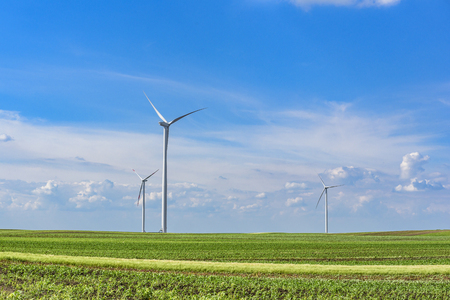 Beautiful field landscape with the windmillsの写真素材