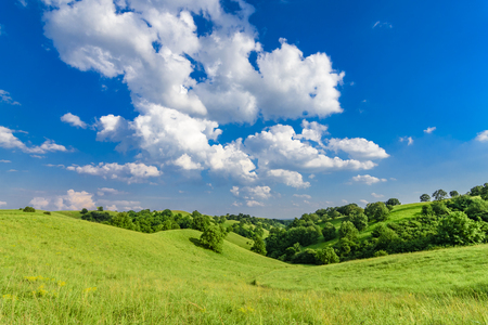 Beautiful landscape of green hills and skyの写真素材