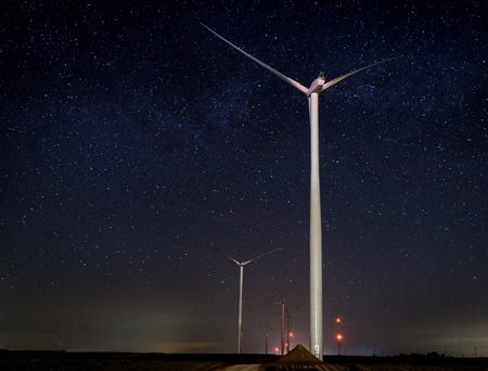The windmills at the night with milky way,long exposure の写真素材