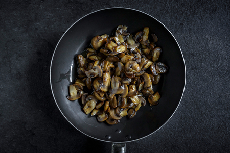 Preparing mashrooms in the pan,selective focusの写真素材