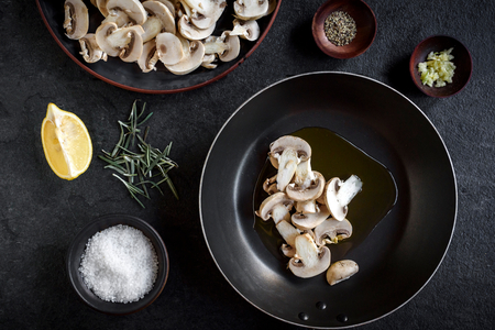 Ingredients served for preparing mushrooms and gnocchi dish,selective focusの写真素材