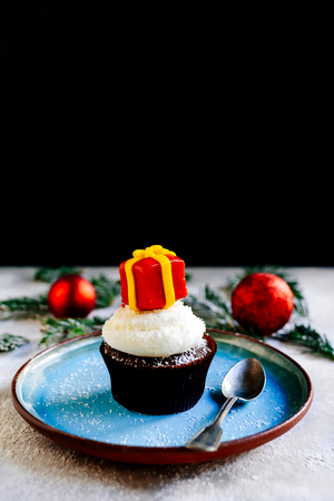 Christmas present on the cup cake,selective focusの写真素材