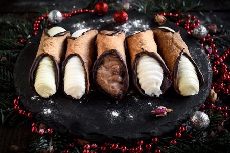 Christmas decoration with traditional Sicilian cannoli,selective focusの写真素材
