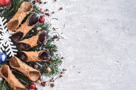 Cannoli with Christmas decoration and blank space,selective focusの写真素材