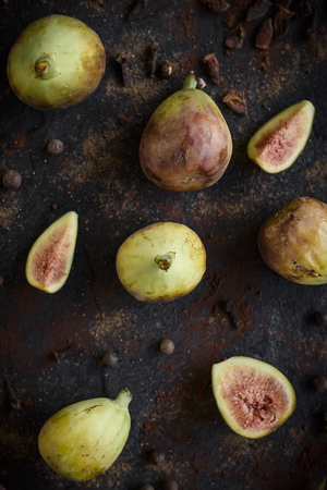 Group of raw figs served on the dark background,selective focusの写真素材