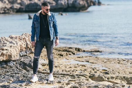 Portrait of man on the beach,selective focus 
