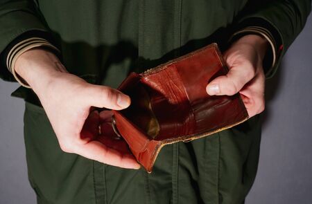 a guy without pants and an empty wallet, no money