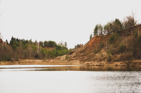 Beautiful lake in an abandoned sand quarry in spring