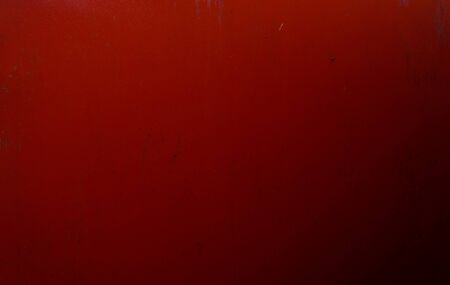 texture of a rusted painted sheet of iron of red color for the background and your