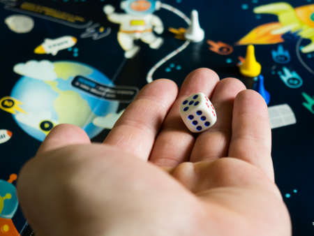 The concept of the board game is a board game board, many pieces, dice, home entertainment for the...