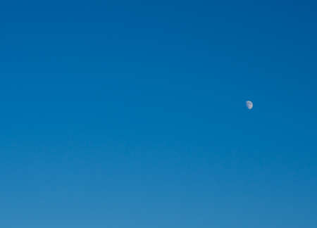 moon on blue sky with place for textの写真素材