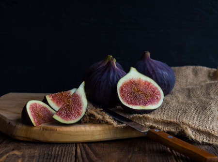 Still life with fresh figs on an old tableの写真素材