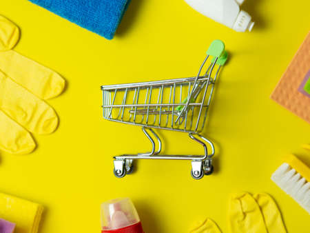 supermarket trolley with cleaning supplies backgroundの写真素材