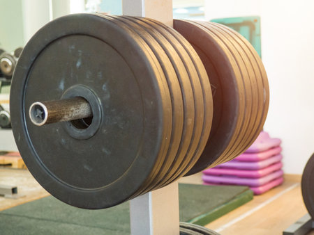 Close up image of fitness equipment in the gym,barbell,barbell pancakesの写真素材