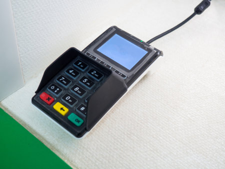 wireless POS terminal on the table. contactless paymentの写真素材