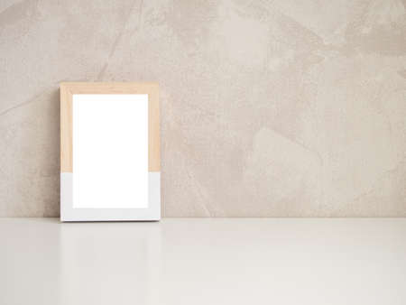 Empty white wooden frame template on concrete background