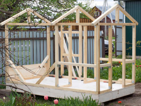 model frame made of timber for a children's house on the playground, a house for a girl in the...