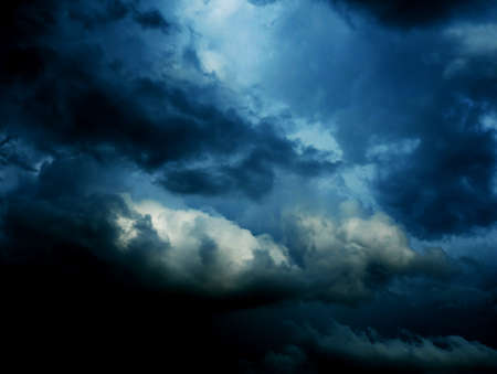 The sky is full of dark clouds in bad weather before a thunderstorm.