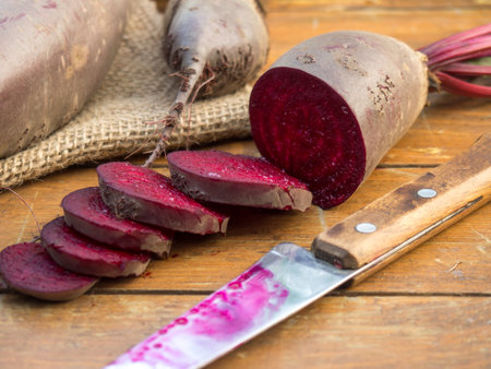 Organic vegetable beetroot on a wooden background close-up. Vegetarian food