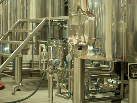 A small industry brewery's brewing tanks in a brewery that produces craft beerの写真素材
