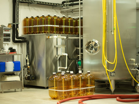 A small industry brewery's brewing tanks in a brewery that produces craft beerの写真素材