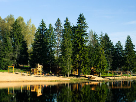 modern wooden playground on the lake shoreの写真素材