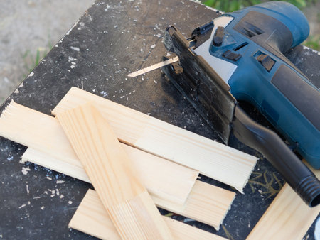 jigsaw on table, saw blade close-up