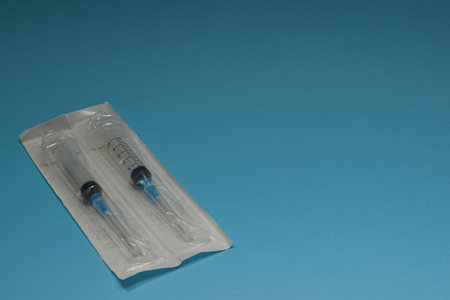 two spitz in a pack on a blue background. human and veterinarian medicine concept