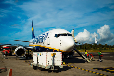 Kerkyra, Greece - 09 29 2022: View of Corfu Airport On Blue Plane of Ryanair. Parking Lot For...
