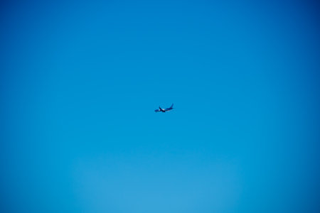 Moraitika, Greece - 09 23 2022: Far Away In Clear Blue Sky Flies TUI Plane.のeditorial素材