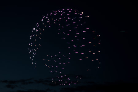 Riga, Latvia - 27.04.2023: Baltic Drone Show, Imitation by drones of the globe with continents.のeditorial素材