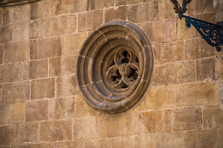 Barcelona, Spain - May 26 2022: beautiful rosette on the wall of the old town, in the Gothic...