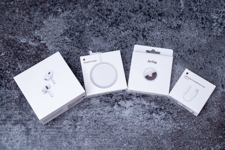 Jurmala, Latvia - 21 09 2023: There are four white boxes from different Apple devices on the table -...