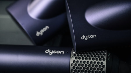 Jurmala, Latvia 23.04.2024: Three Dyson hair dryers are shown in a row. Airwrap multi-styler Complete Long Blue and Copperのeditorial素材