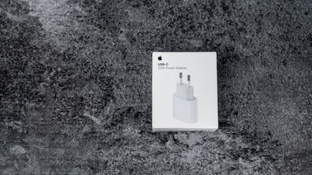 Jurmala, Latvia 22.06.2024: White box from Apples original 20W charging adapter.