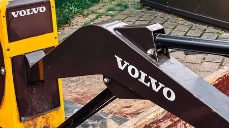 Riga, Latvia - 14 07 2024: A close up of a Volvo emblem on a piece of equipment. A childs toy, an...