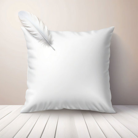White pillow with feather on white wooden table. 3d illustration.の素材