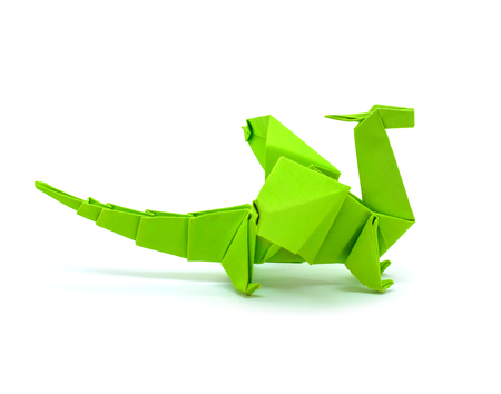 Photo of beautiful origami green dragon isolated on white backgroundの写真素材