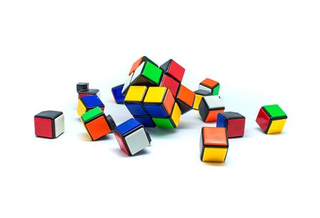 Photo of many small color cubes isolated on white backgroundの写真素材