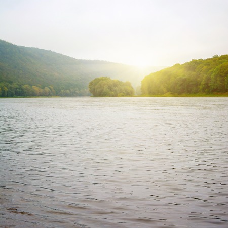 Photo of big beautiful river, view from beachの写真素材