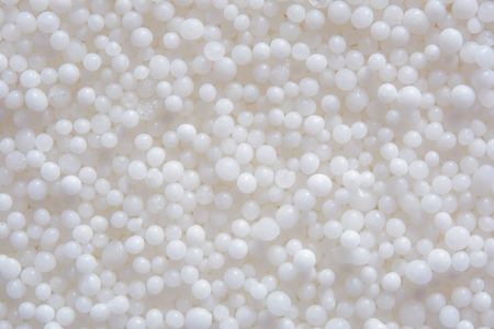Photo of white saltpeter texture consist of many little balls