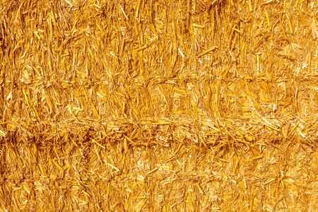 Photo of beautiful dry yellow straw texture at summer dayの写真素材