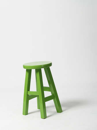 Green wooden chair isolated on white background. 
