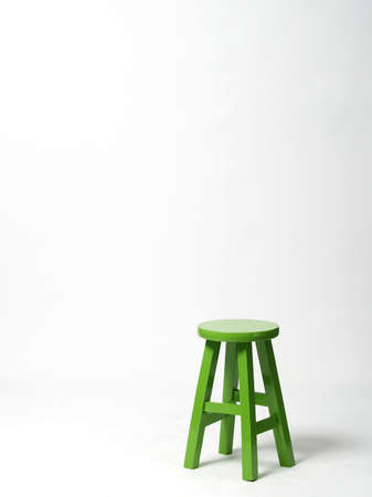 Green wooden chair isolated on white background. 