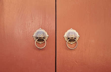 Chinese traditional door with lion knocker, Phuket Thailand 