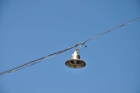 Outdoor hanging lamp on bluesky の写真素材