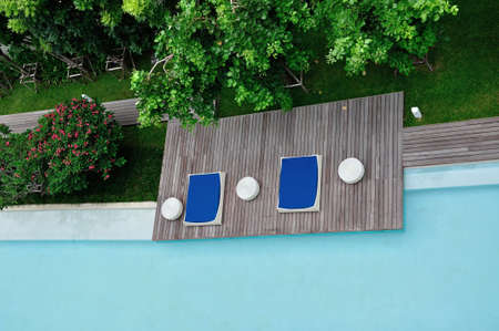 Rest area beside swimming pool at the resort 