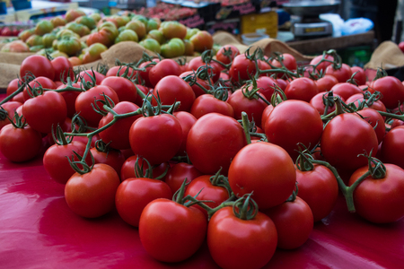 Tomatoes on a street marketの写真素材